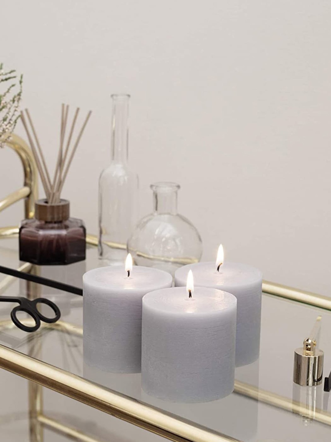 

Aromatic Grey 3-Pieces Rustic Pillar Candles