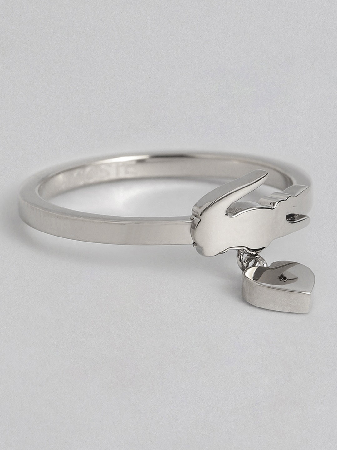 

Lacoste Women Brass Plated Brand Logo Design Stainless Steel Finger Ring With A Heart Drop, Silver