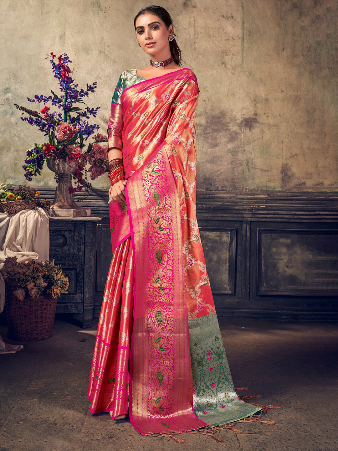 

Mitera Orange & Blue Ethnic Motifs Woven Design Zari Kanjeevaram Saree