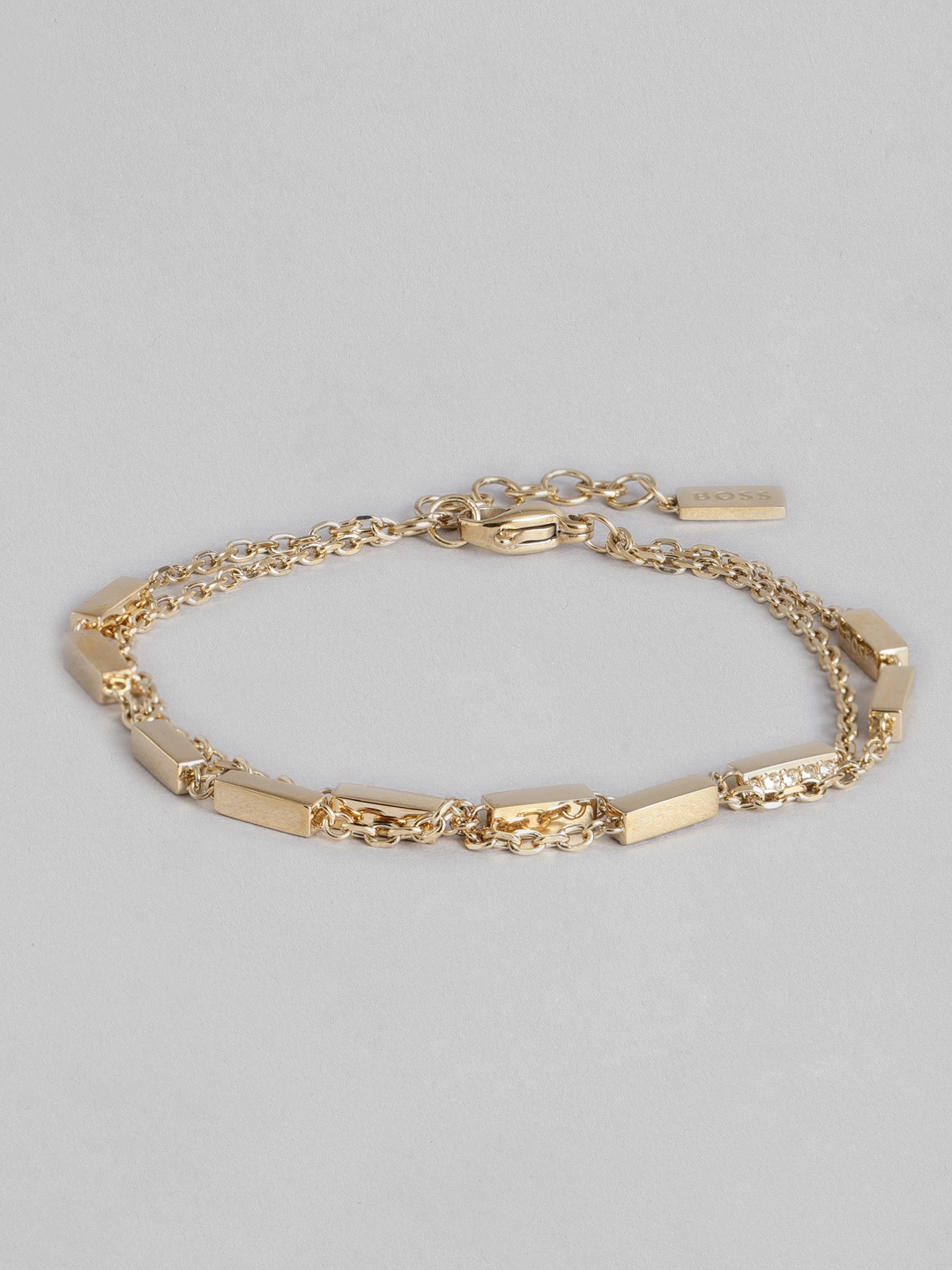 

Hugo Boss Women Laria Crystal Stainless Steel Brass-Plated Charm Bracelet, Gold