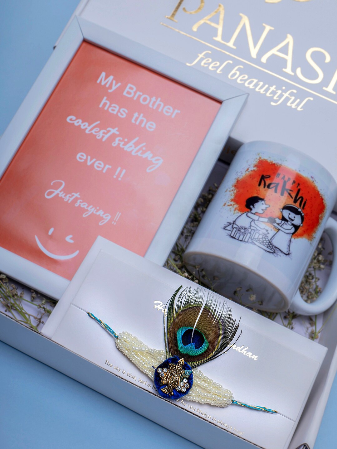 

PANASH Gold Plated Thread Rakhi With Mug & Frame & Roli Chawal