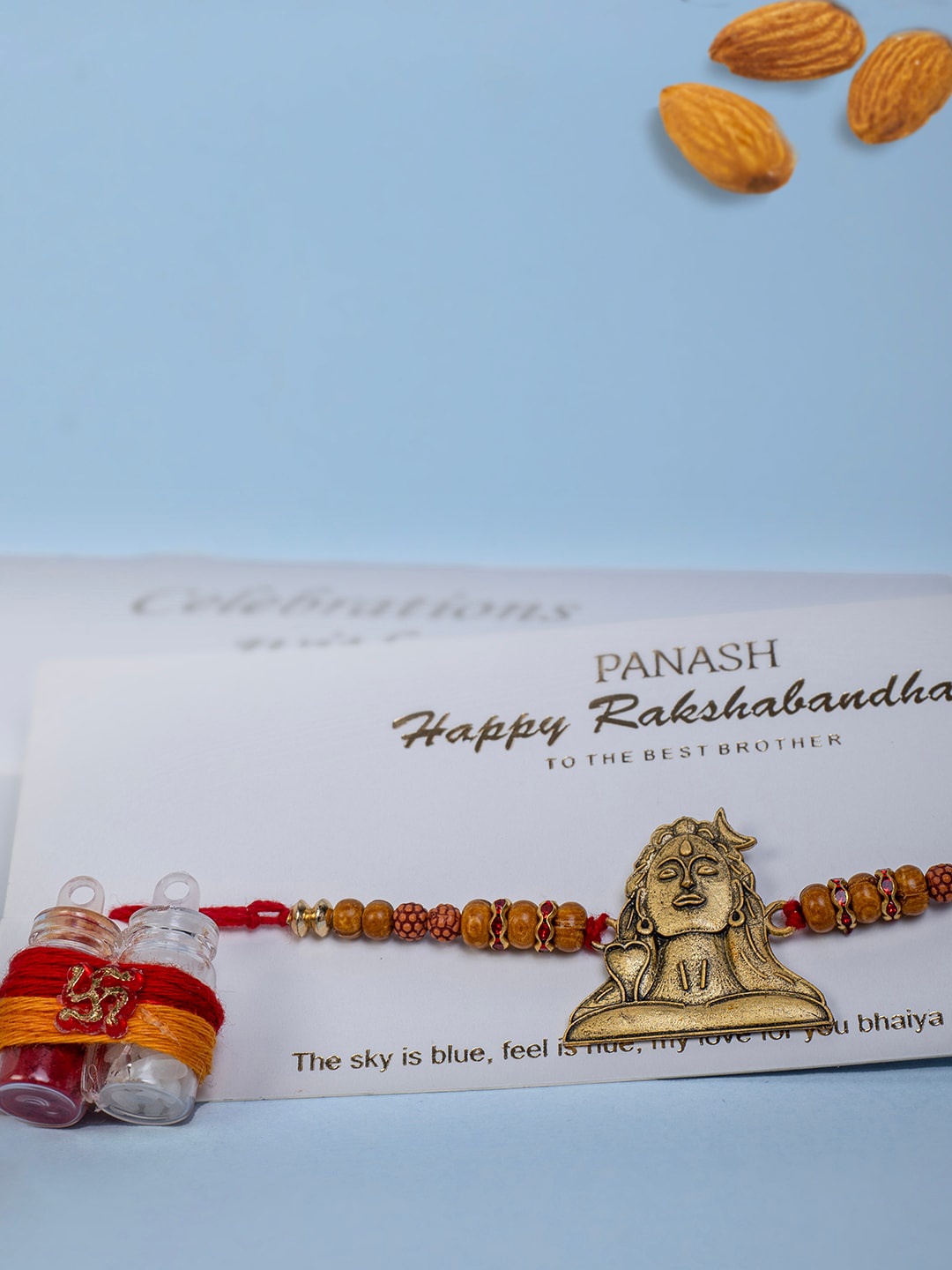 

PANASH Gold-Plated Shiv Adiyogi Thread Rakhi With Roli Chawal