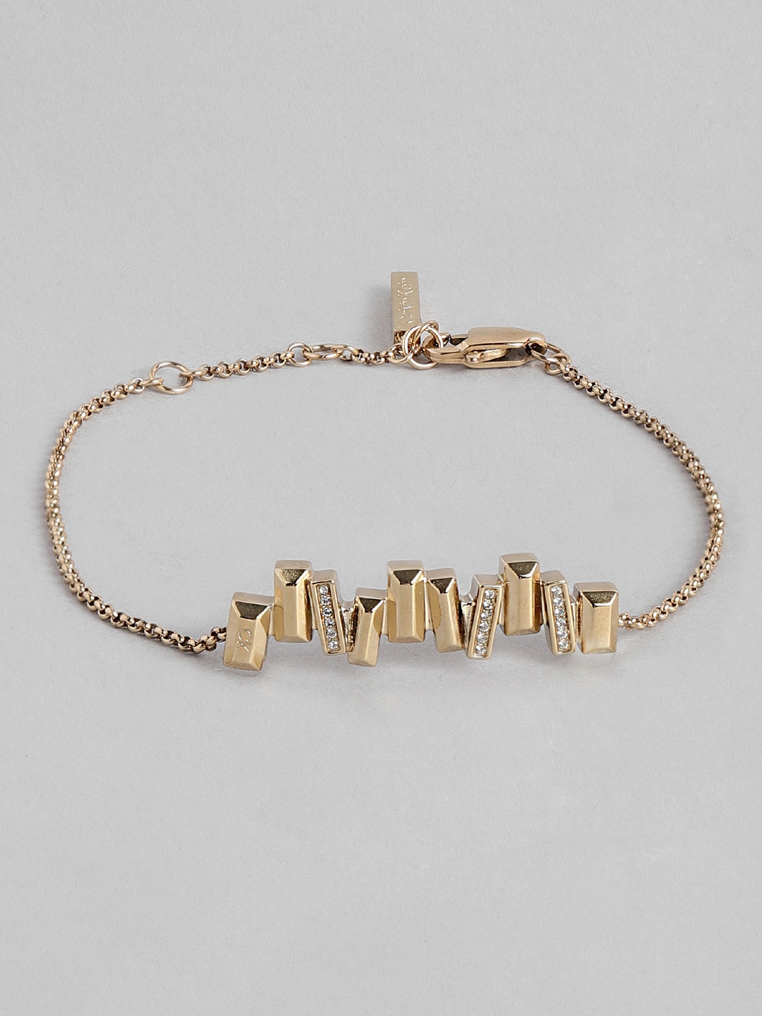 

Calvin Klein Women Luster Crystals Studded Charm Bracelet, Gold