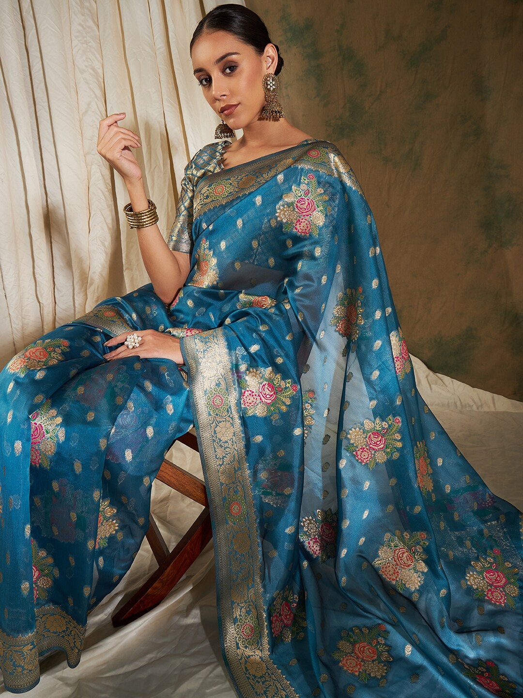 

Sangria Blue & Gold-Toned Floral Woven Design Organza Zari Kanjeevaram Saree