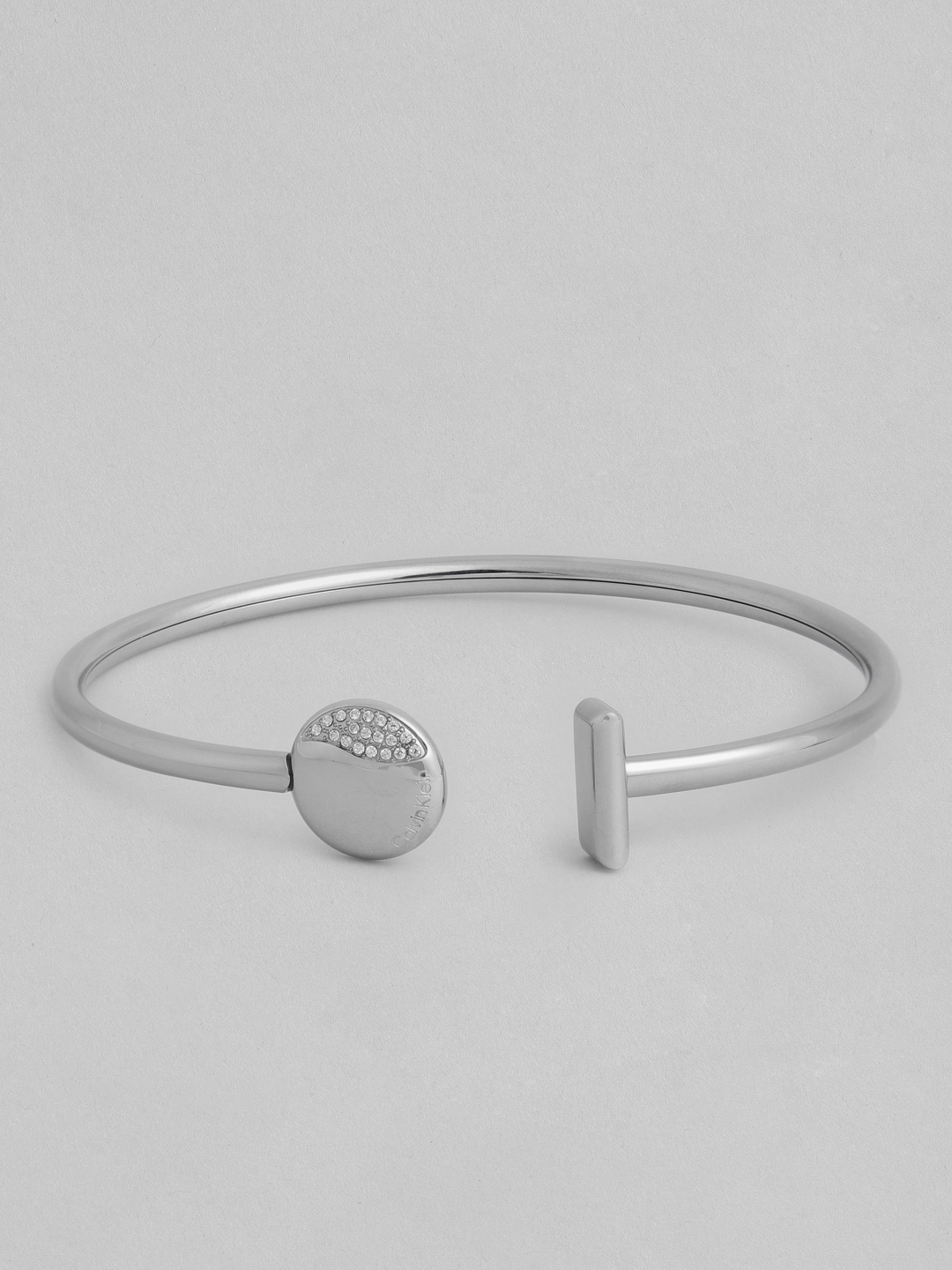 

Calvin Klein Women Minimal Circular Crystals Studded Bangle, Silver