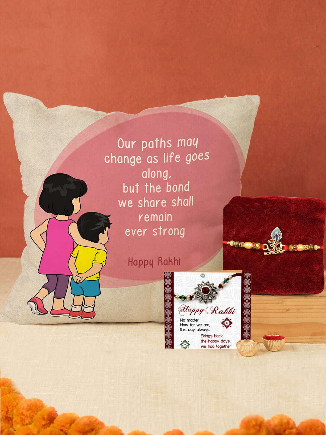 

TIED RIBBONS Unisex Premium Om Rakhi With Cushion Card Roli Chawal Gift Set, Gold