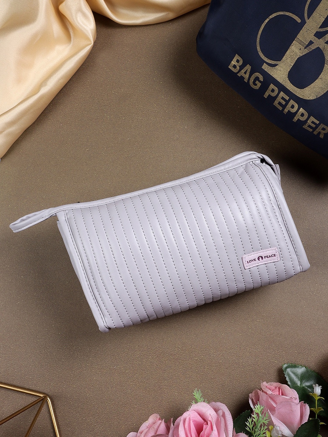 

Bag Pepper Textured Travel Pouch, Lavender