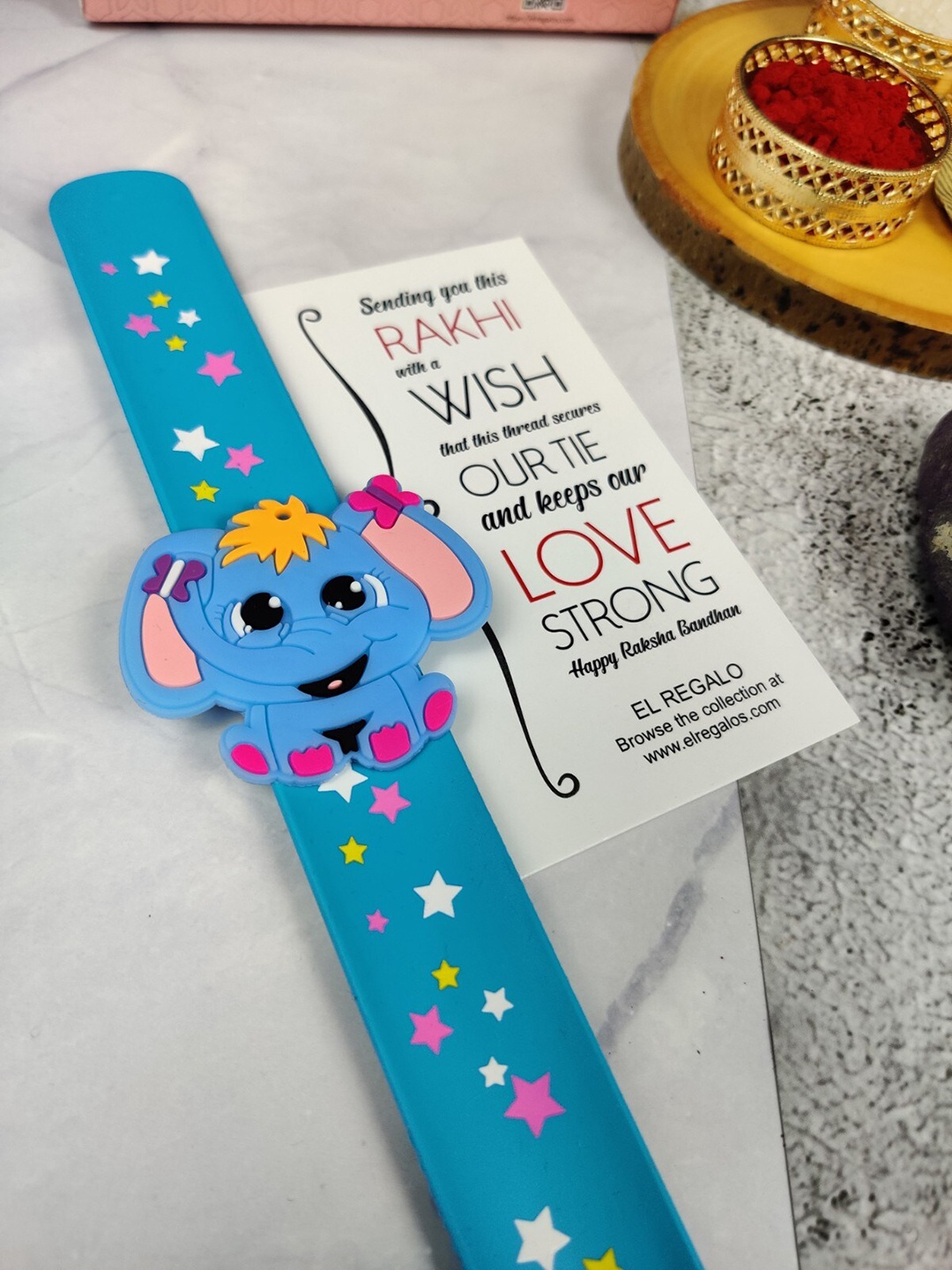 

EL REGALO Kids Elephant Design Slap Band Rakhi With Roli Chawl & Card Gift Set, Blue