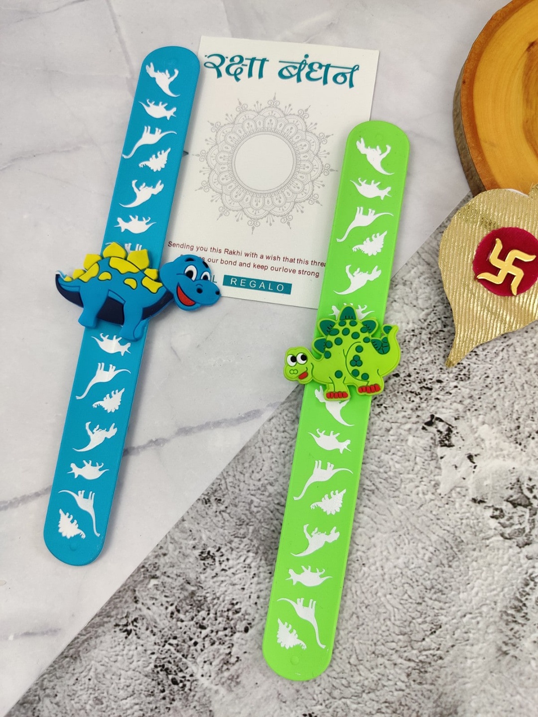 

EL REGALO Kids 2 Pcs Dinosaur Design Slap Band Rakhi With Roli Chawl & Card Gift Set, Green