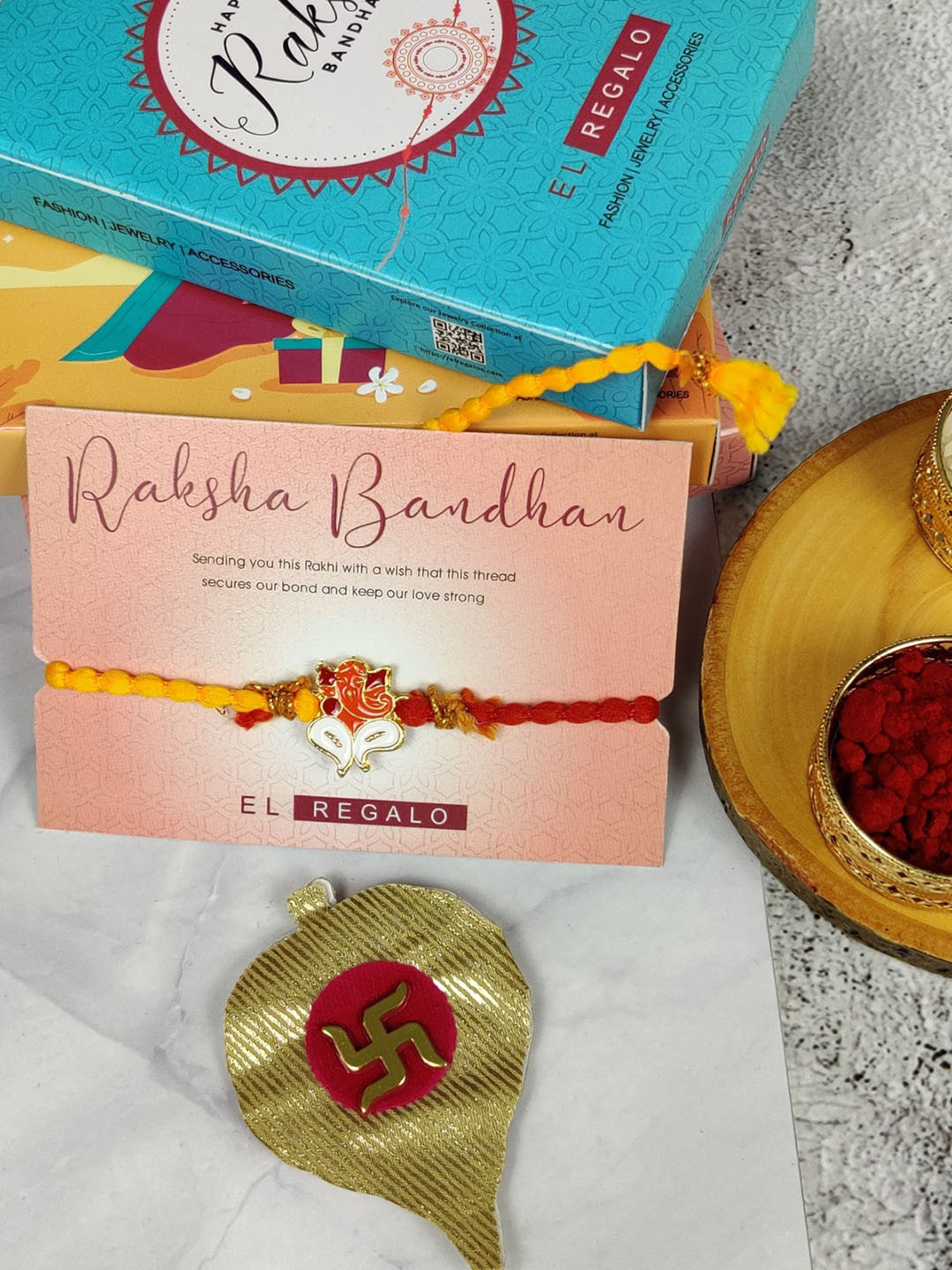 

EL REGALO Kids Ganesh Charm Design Thread Rakhi, Yellow
