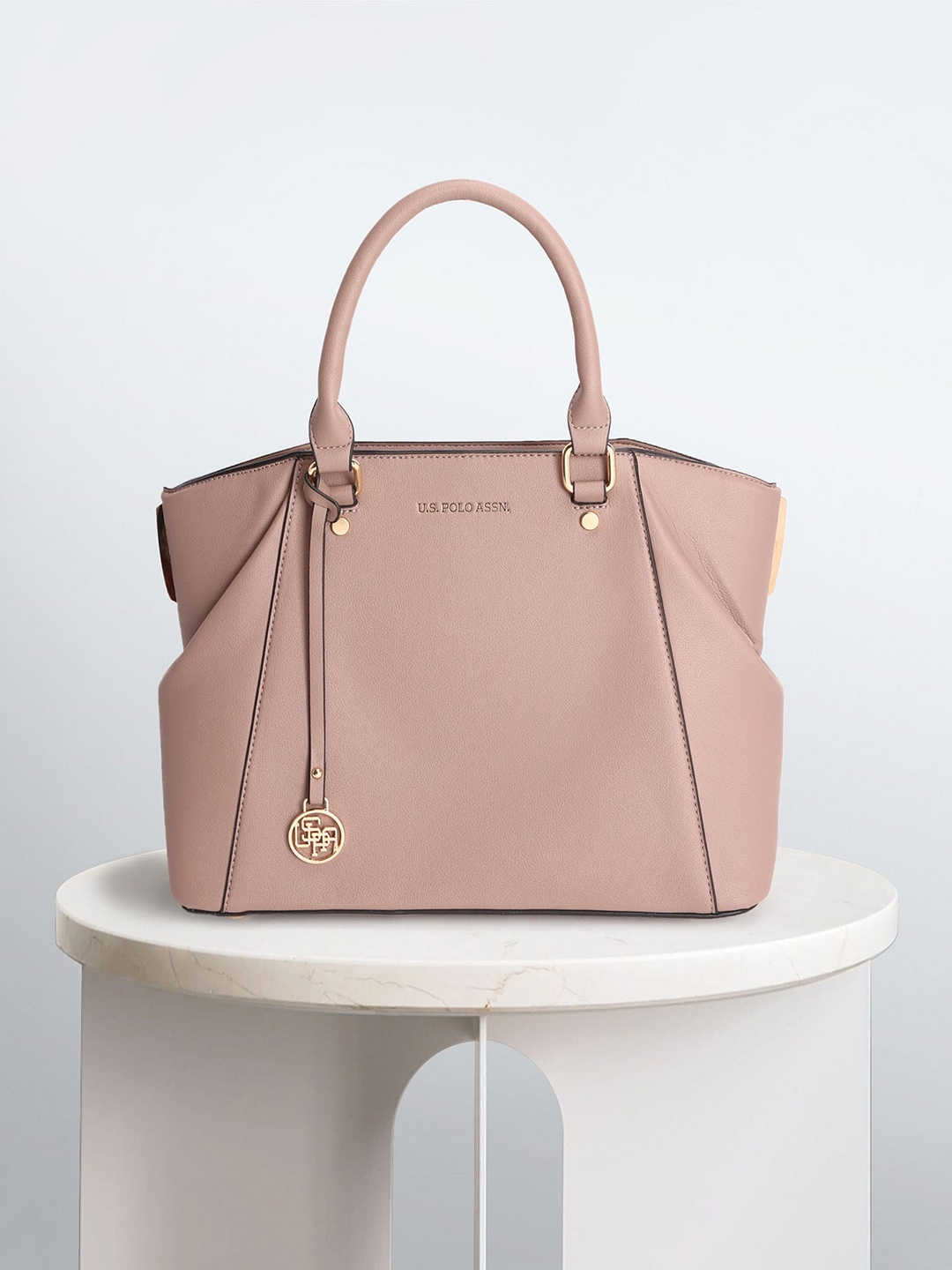 

U.S. Polo Assn. Women Textured Structured Handheld Bag With Tasselled, Nude