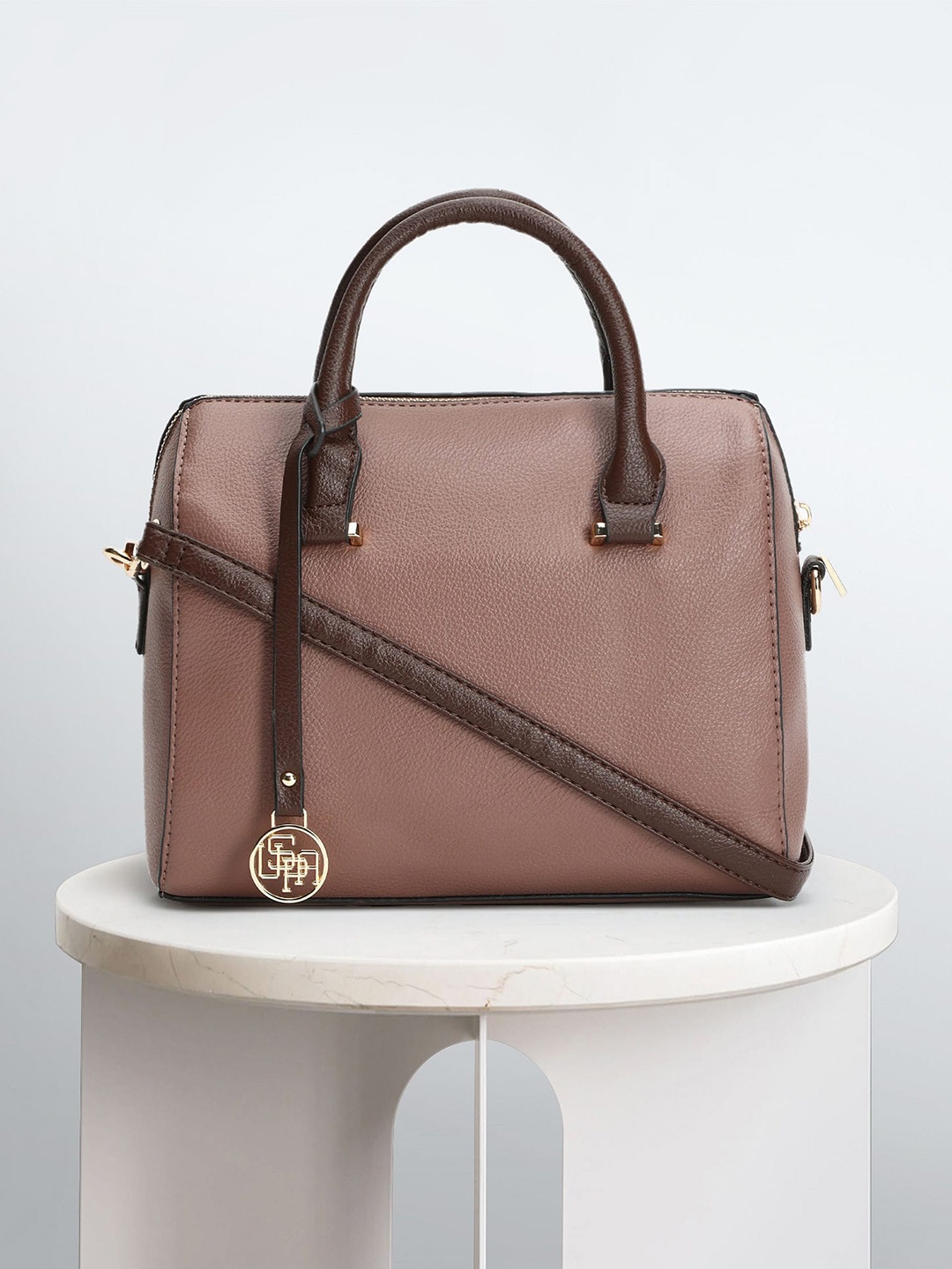 

U.S. Polo Assn. Women Textured Structured Handheld Bag With Tasselled Detail, Pink