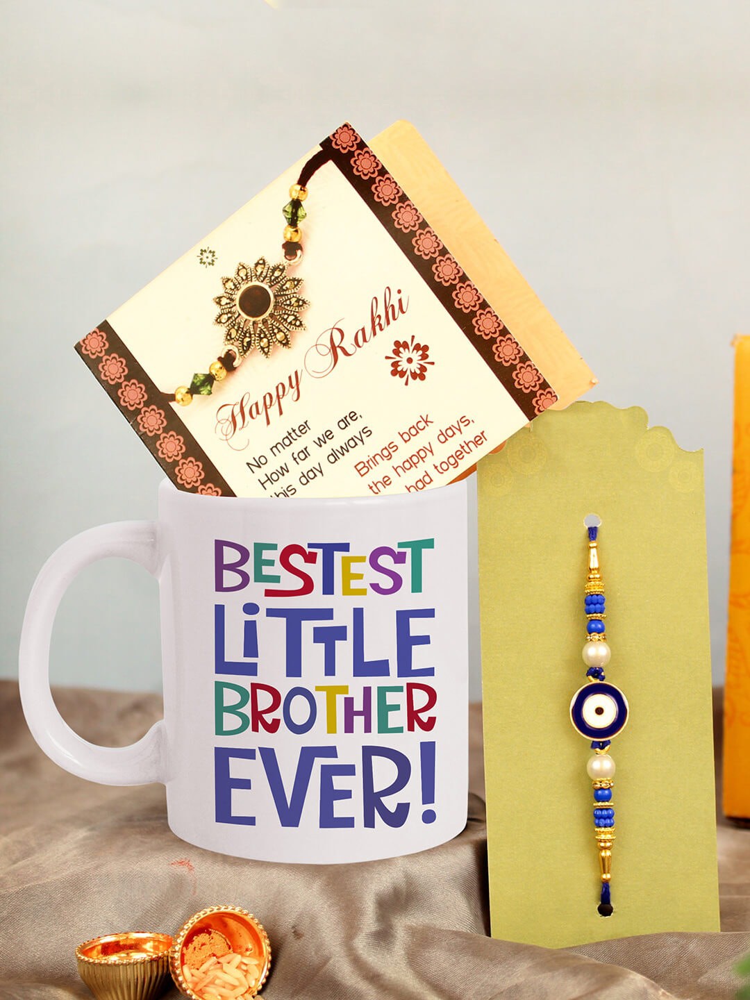 

TIED RIBBONS Unisex Evil Eye Charm Rakhi With Roli Chawal & Mug & Card Gift Set, Blue