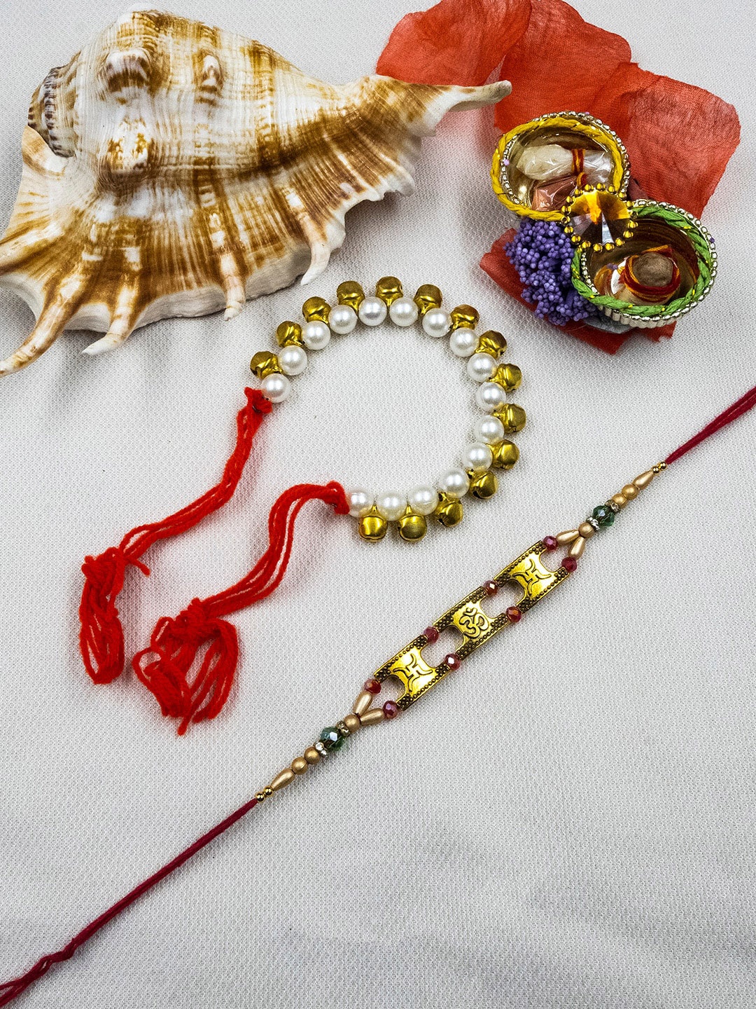 

StileAdda Unisex Set Of 2 Bhai Bhabhi Rakhi & Roli Chawal Gift Set, Red