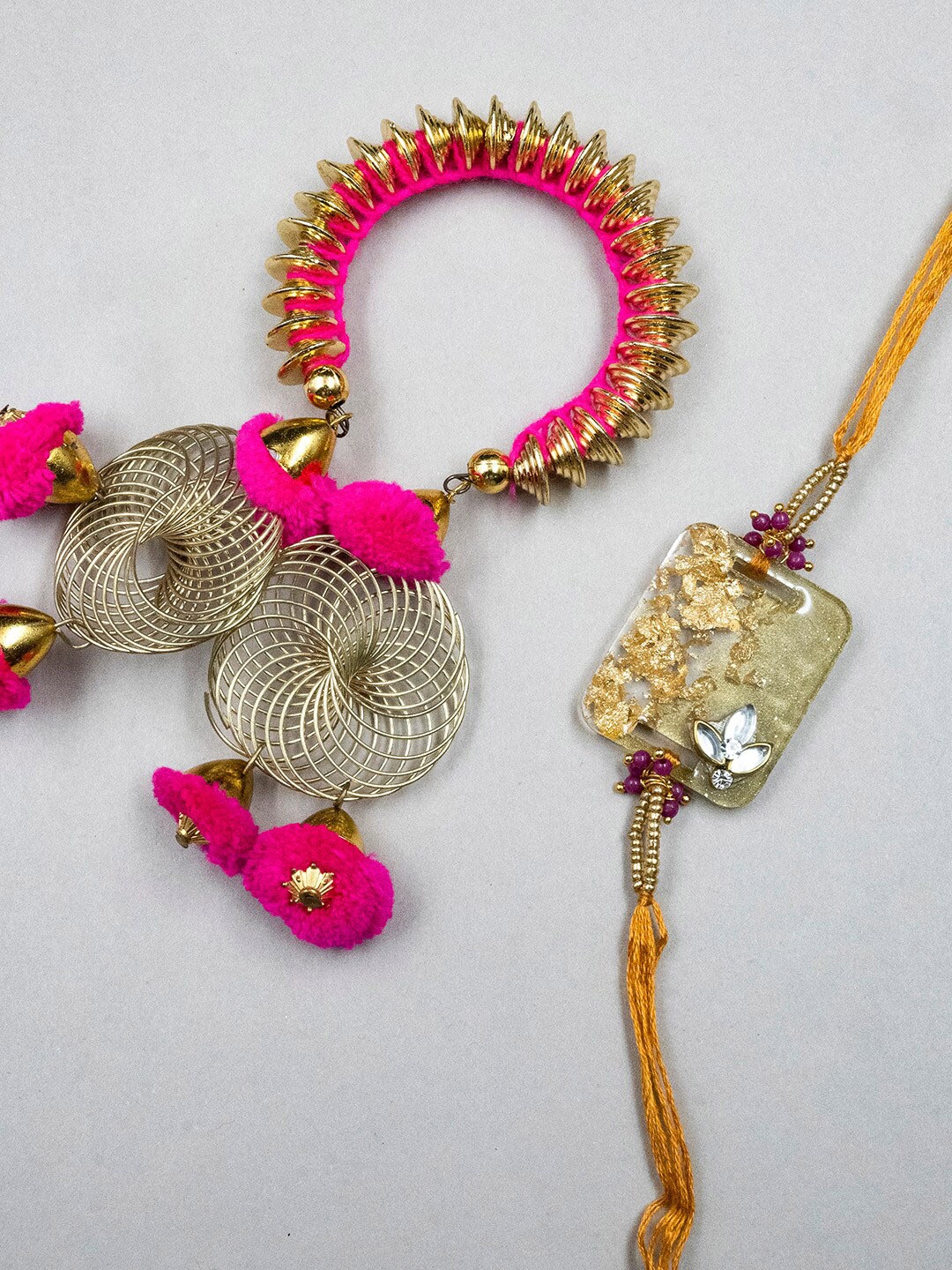 

StileAdda Unisex Set Of 2 Bhai Bhabhi Rakhi & Roli Chawal Gift Set, Pink