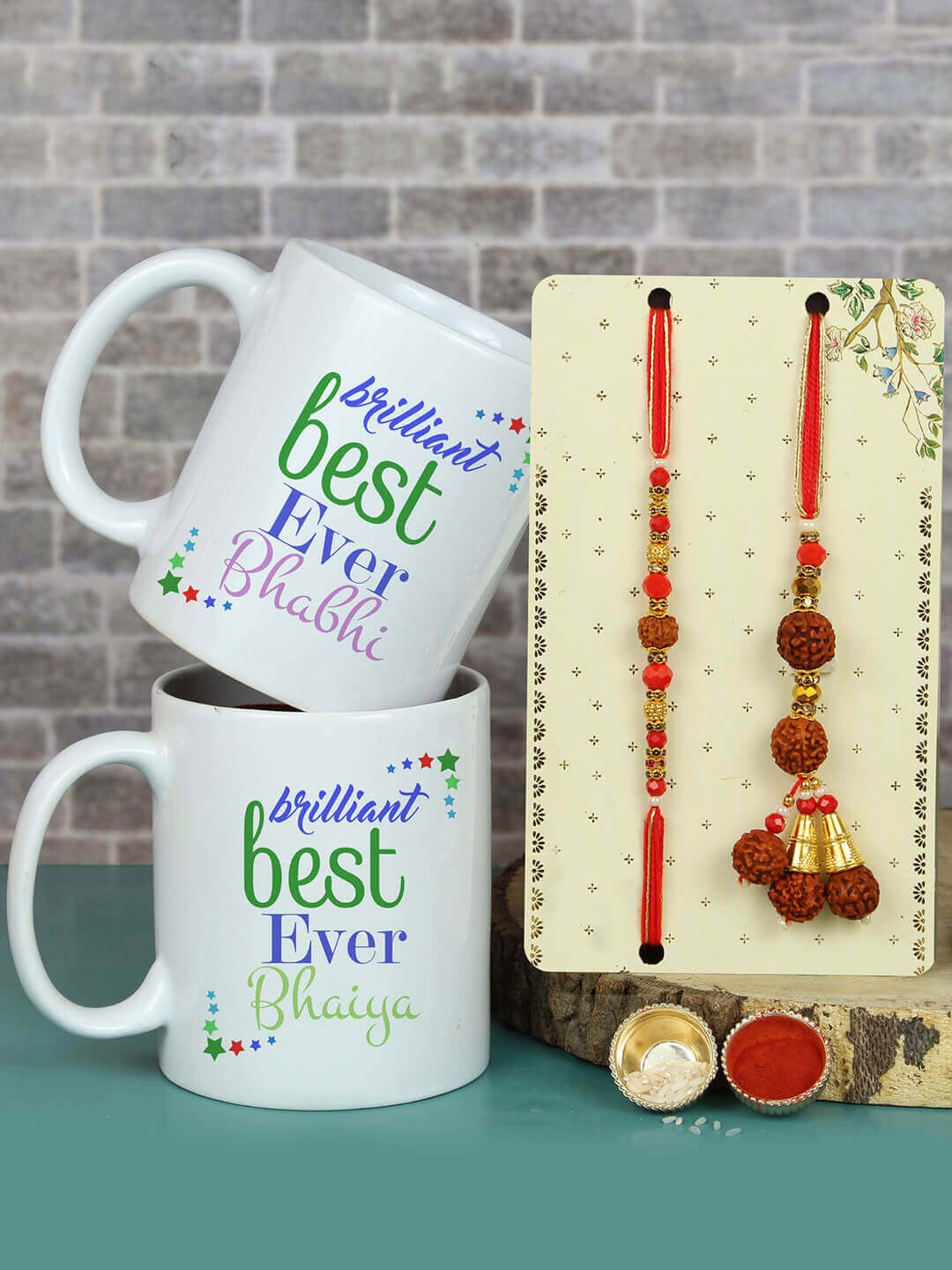 

TIED RIBBONS Unisex Set Of 2 Rudraksh Bhaiya Bhabhi Rakhi With 2 Mugs & Roli Chawl Cards, Multi