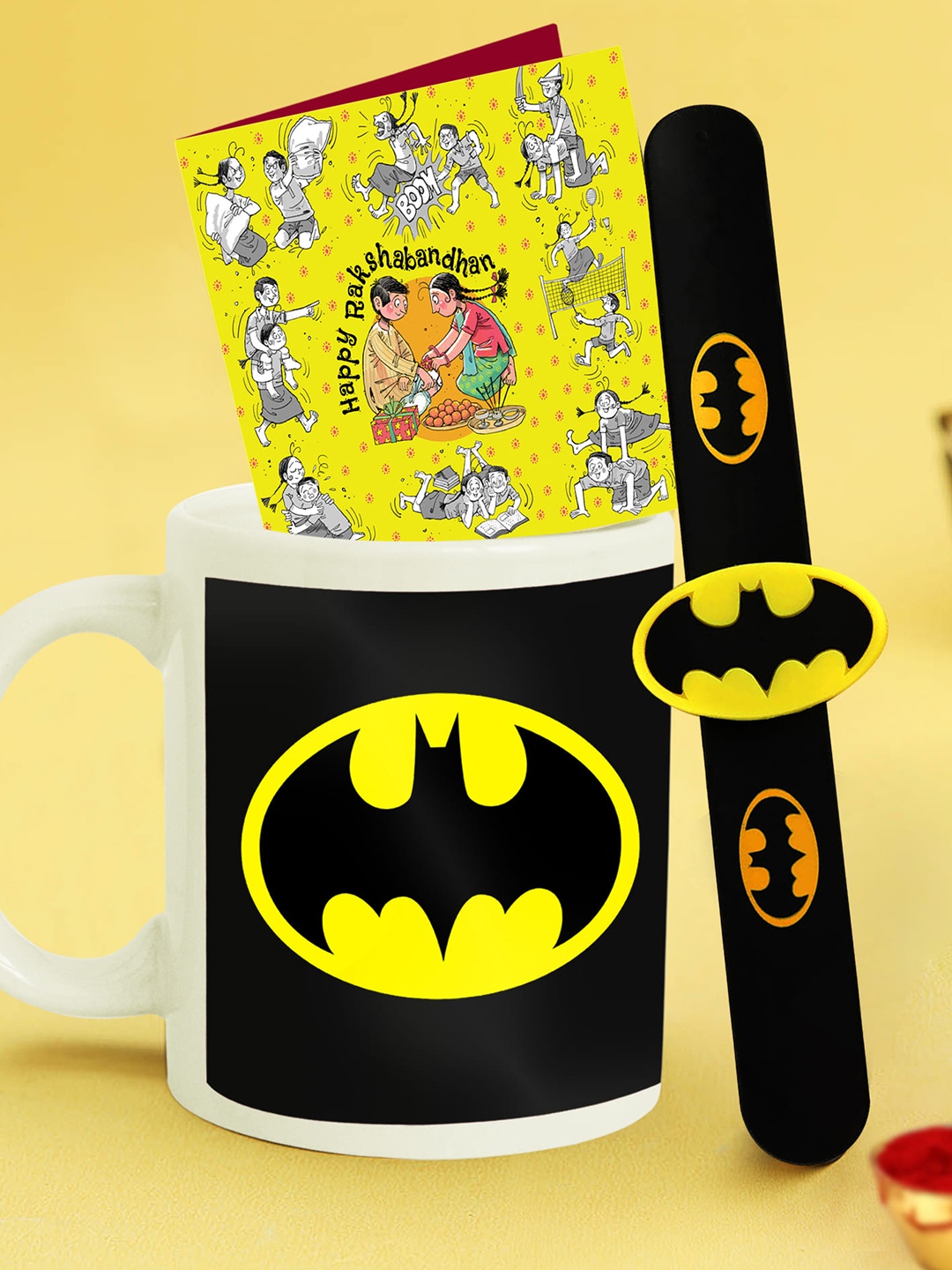 

TIED RIBBONS Kids Batman Rakhi With Mug Gift Set, Yellow