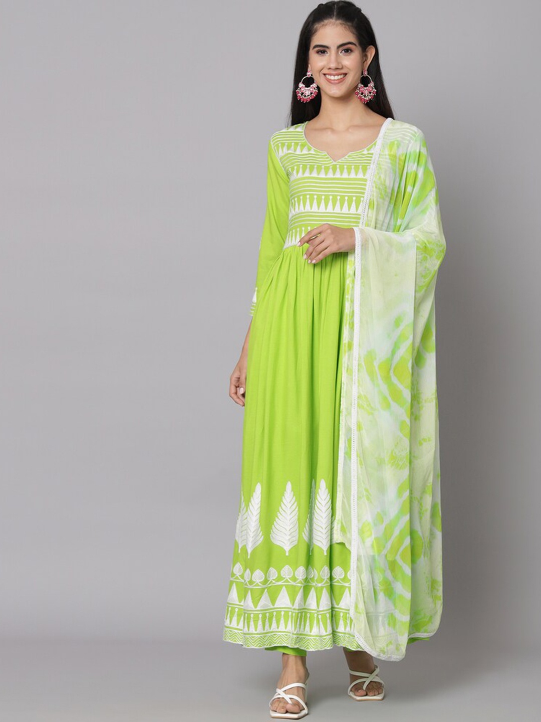 

Meeranshi Embroidered High Slit Thread Work Kurta with Trousers & Dupatta, Lime green