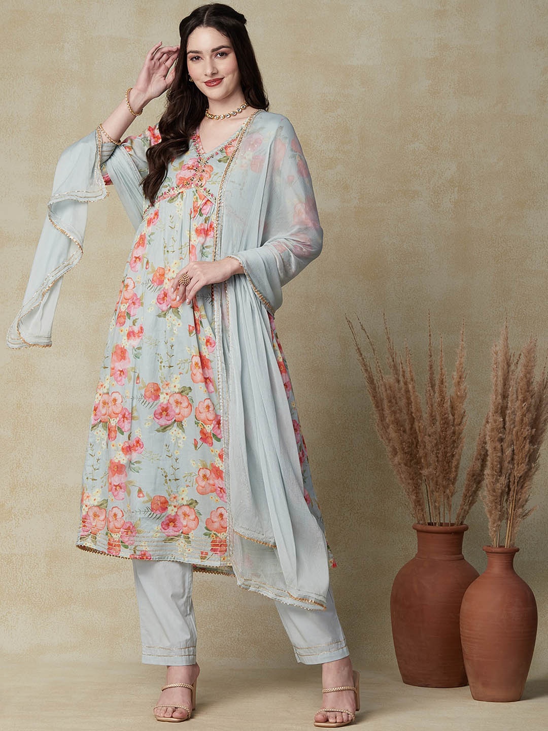 

FASHOR Blue Floral Screen Printed Thread Work Empire A-Line Kurta with Trousers & Dupatta