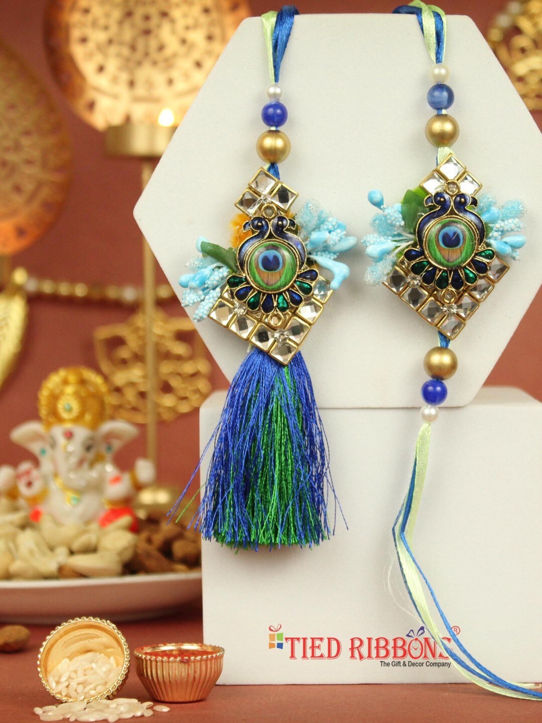 

TIED RIBBONS Set Of 2 Bhaiya Bhabhi Rakhi With Card & Roli Chawal, Blue