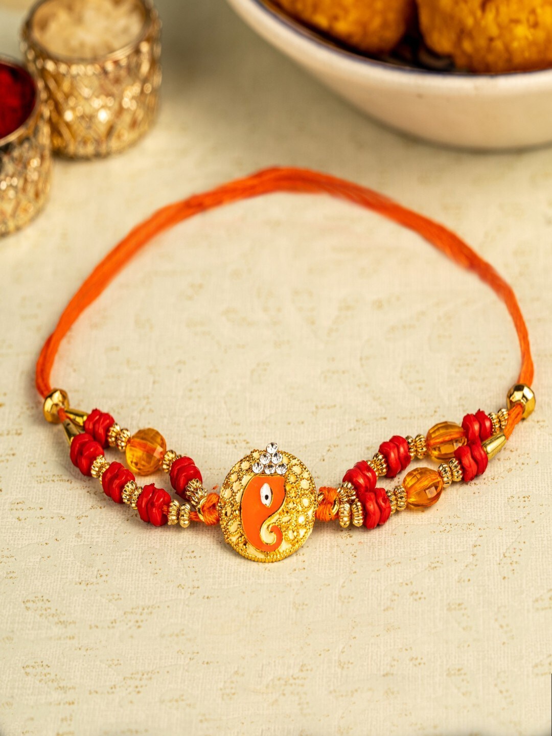

TIED RIBBONS Unisex Ganesh Design Rakhi, Gold
