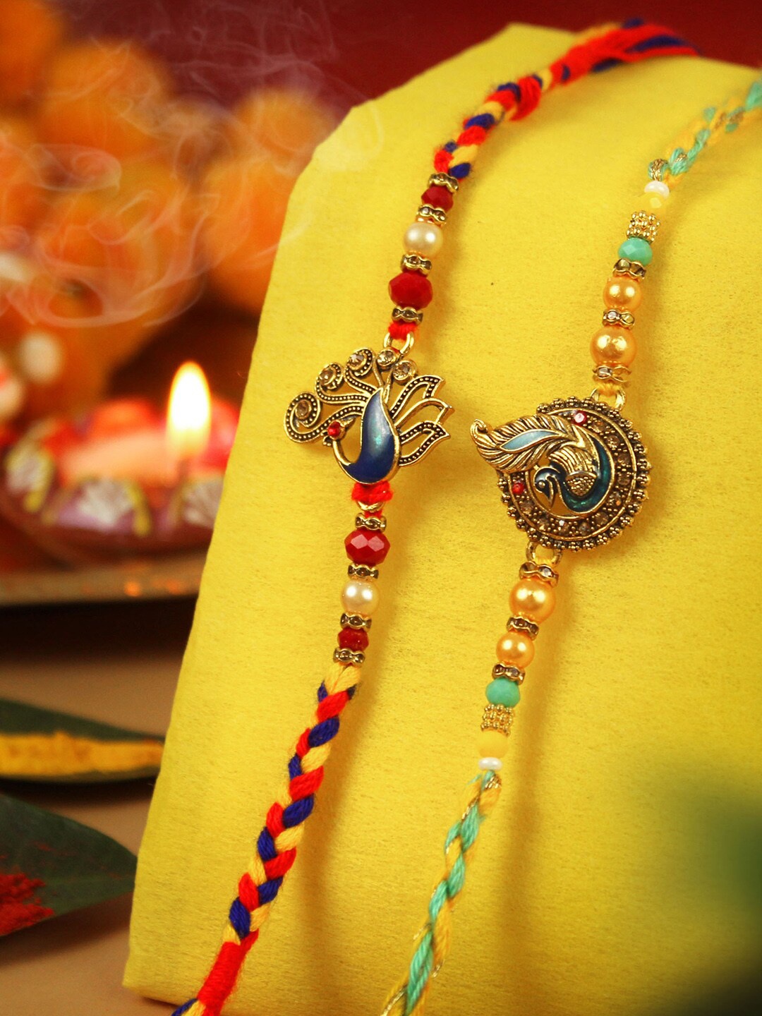 

TIED RIBBONS Unisex Set Of 2 Rakhi With Card & Roli Chawal, Gold