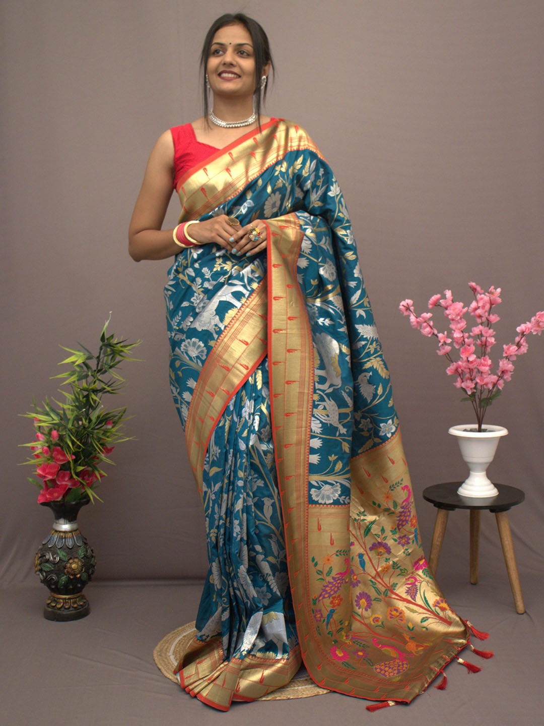 

CLEMIRA Floral Woven Design Zari Saree, Turquoise blue