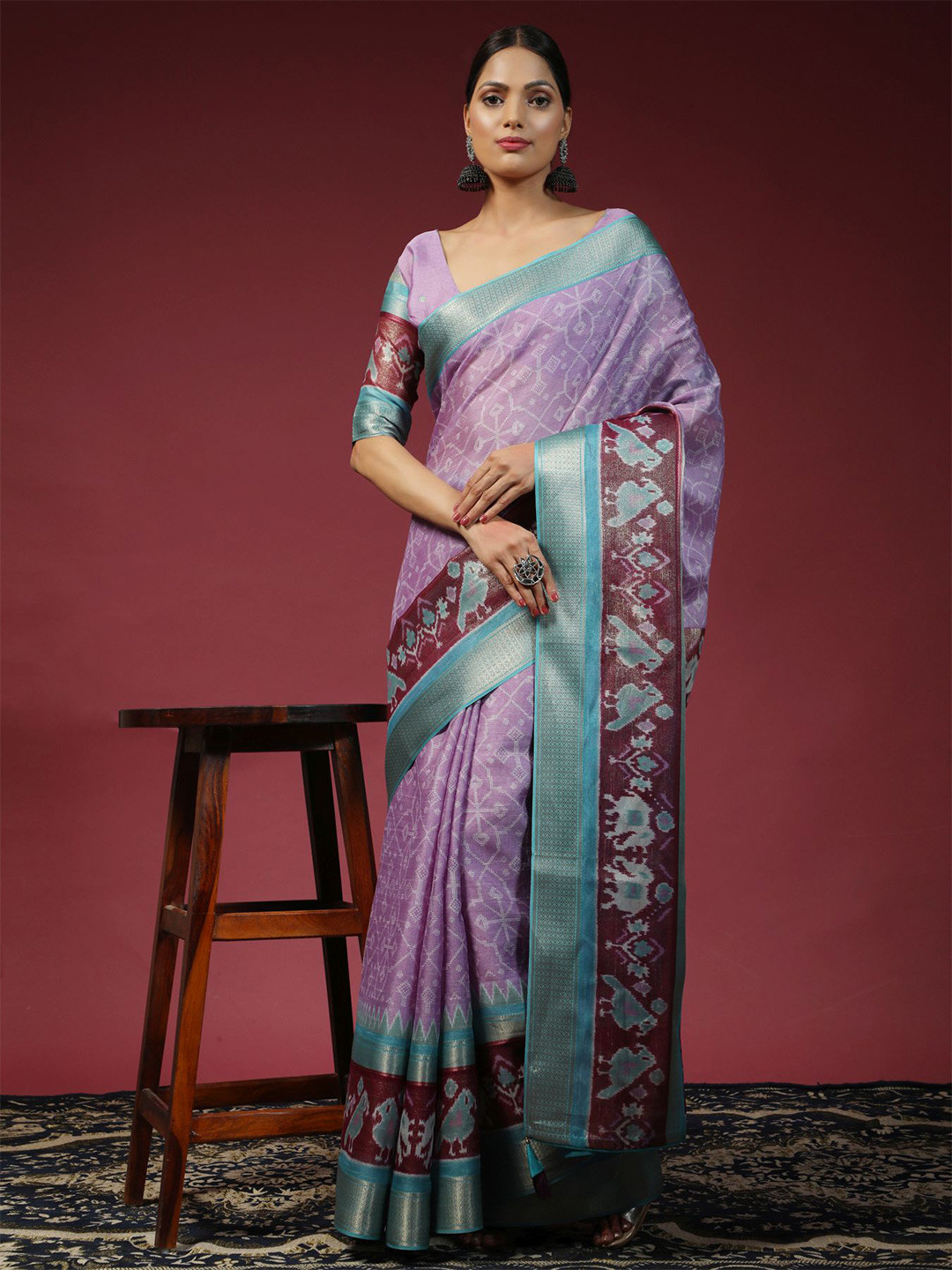 

Phenav Ethnic Motif Printed Zari Patola Saree, Lavender