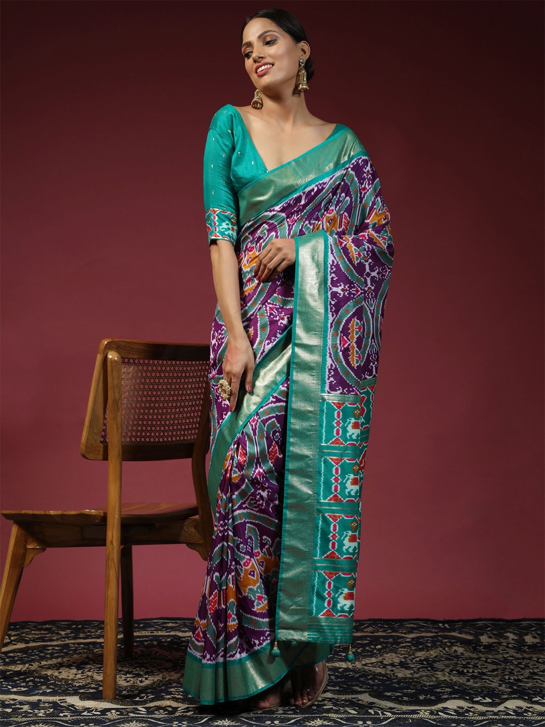 

Phenav Ethnic Motif Printed Zari Patola Saree, Purple