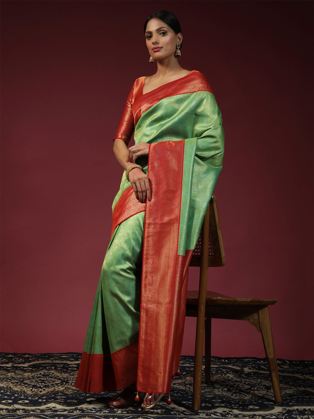 

Phenav Paisley Woven Design Zari Kanjeevaram Saree, Green