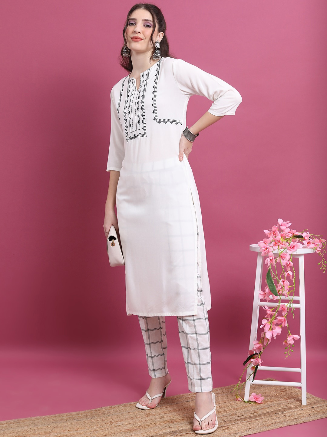 

Vishudh Off White Yoke Design Thread Work Kurta With Trousers