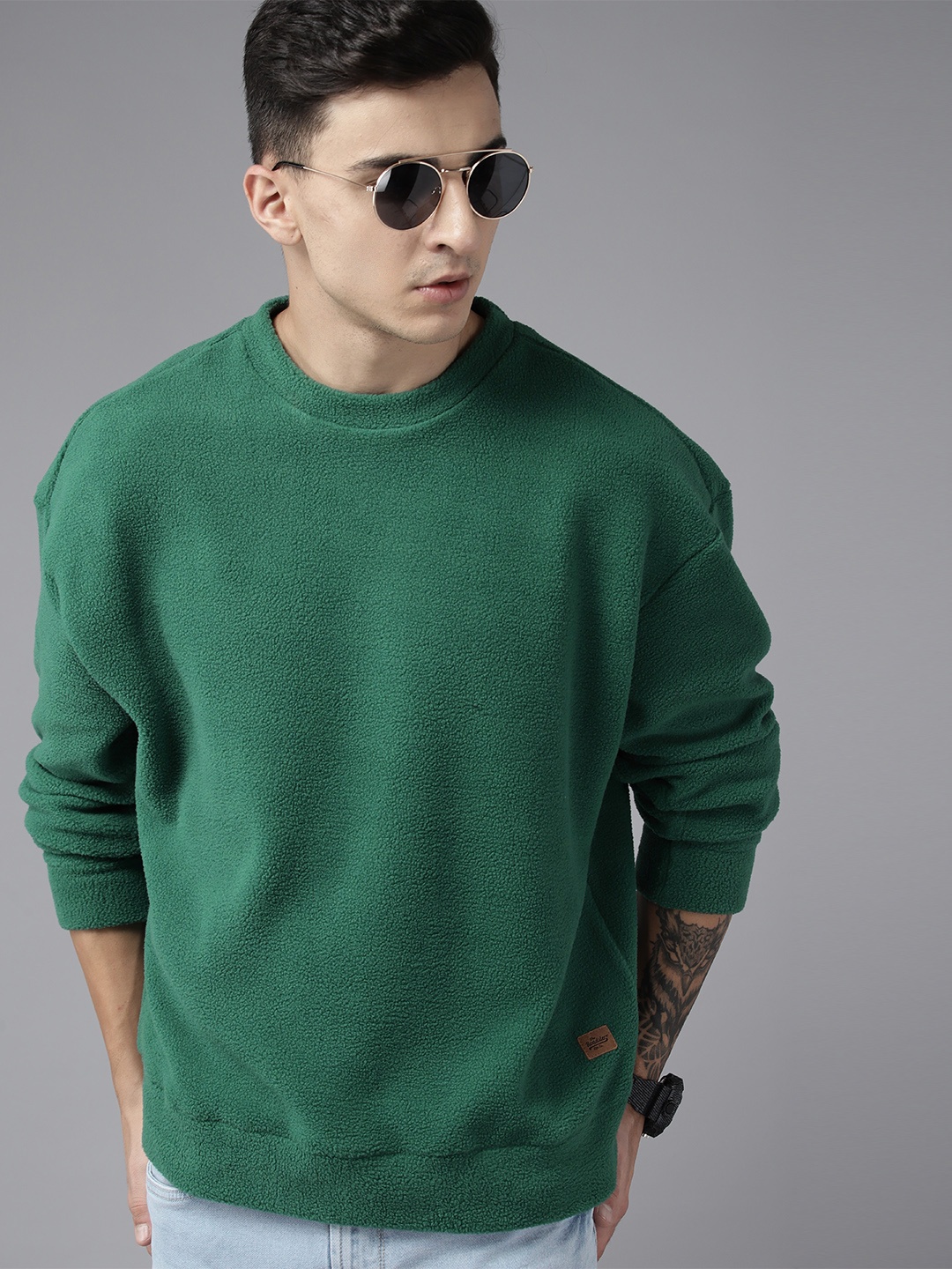 

Roadster Men Solid Sweatshirt, Green