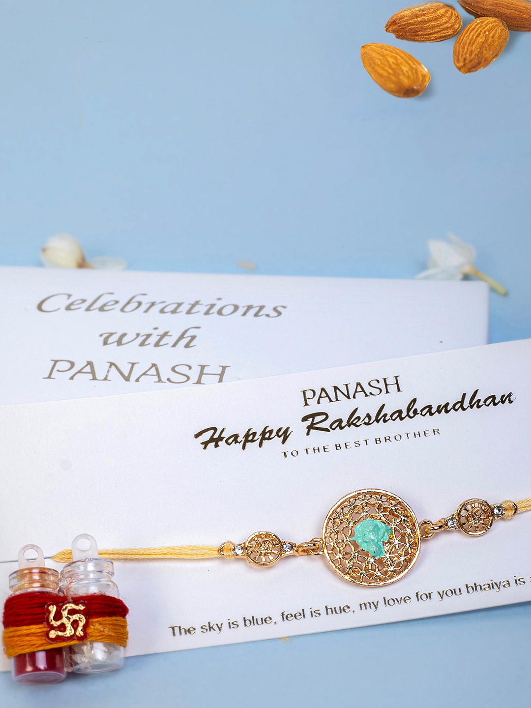 

PANASH Men Gold-Plated Circular-Shaped Lord Ganesh Thread Rakhi With Roli Chawal