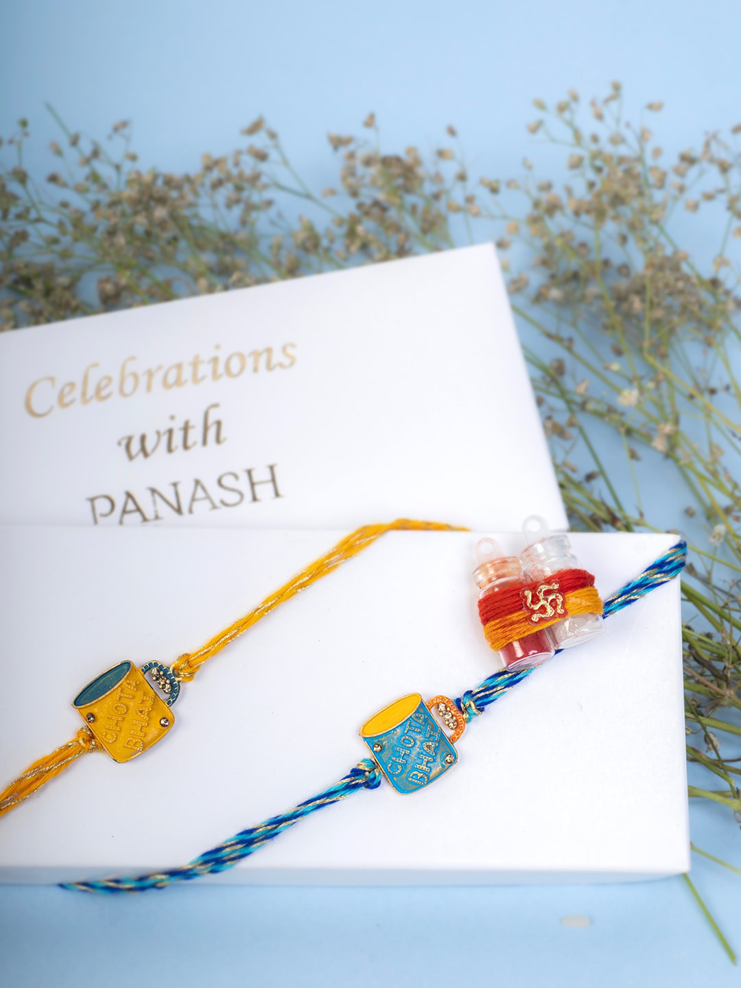 

PANASH Kids Set Of 2 Gold-Plated Cup-Shaped Thread Rakhi With Roli Chawal, Yellow
