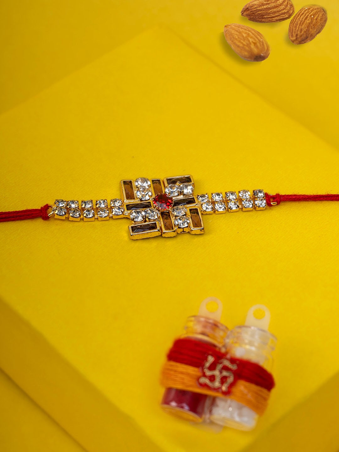 

PANASH Gold-Plated Stone-Studded Satya Rakhi With Roli Chawal Gift Set