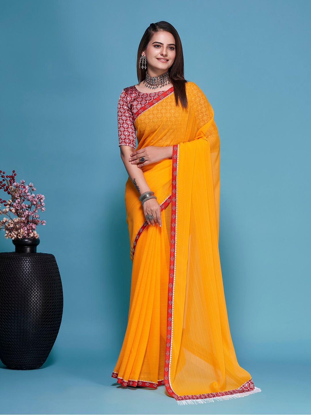 

TEREZA Solid Pure Georgette Saree, Yellow