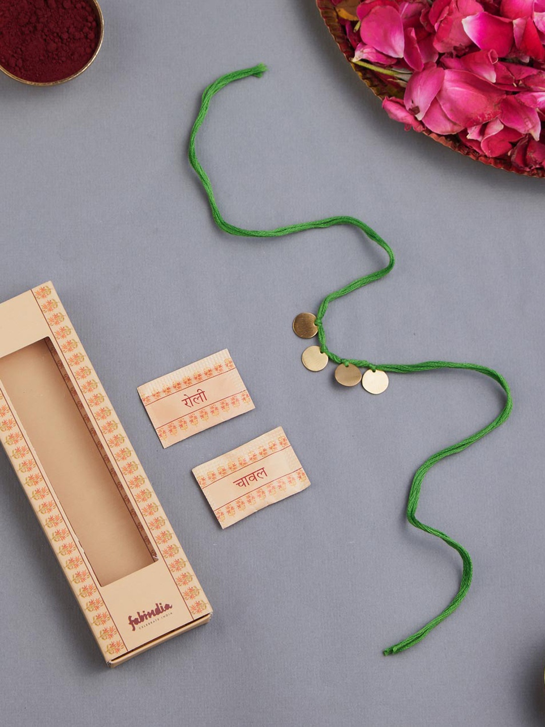 

Fabindia Unisex Gold-Plated Rakhi With Roli & Chawal