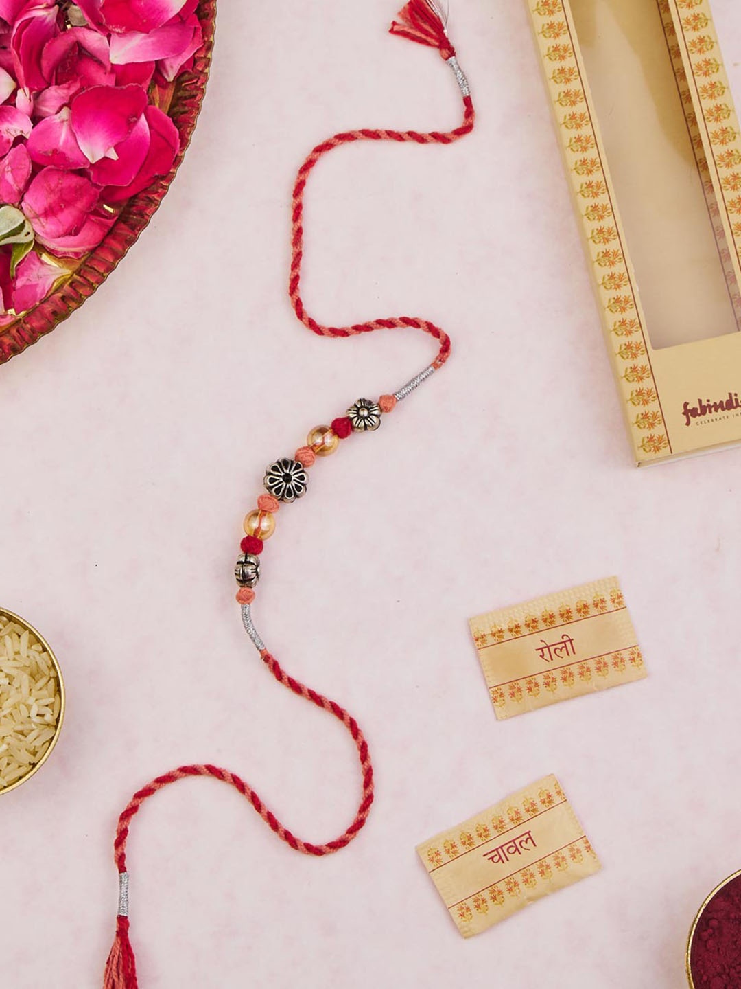 

Fabindia Flower Glass Beads Rakhi With Roli & Chawal, Red