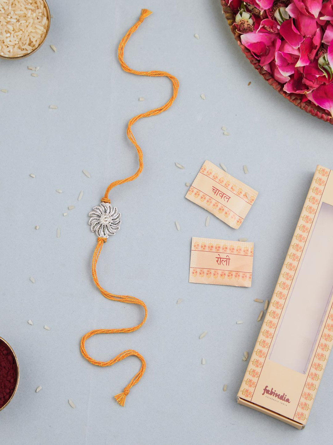 

Fabindia Flower Filigree Rakhi With Roli & Chawal, Yellow