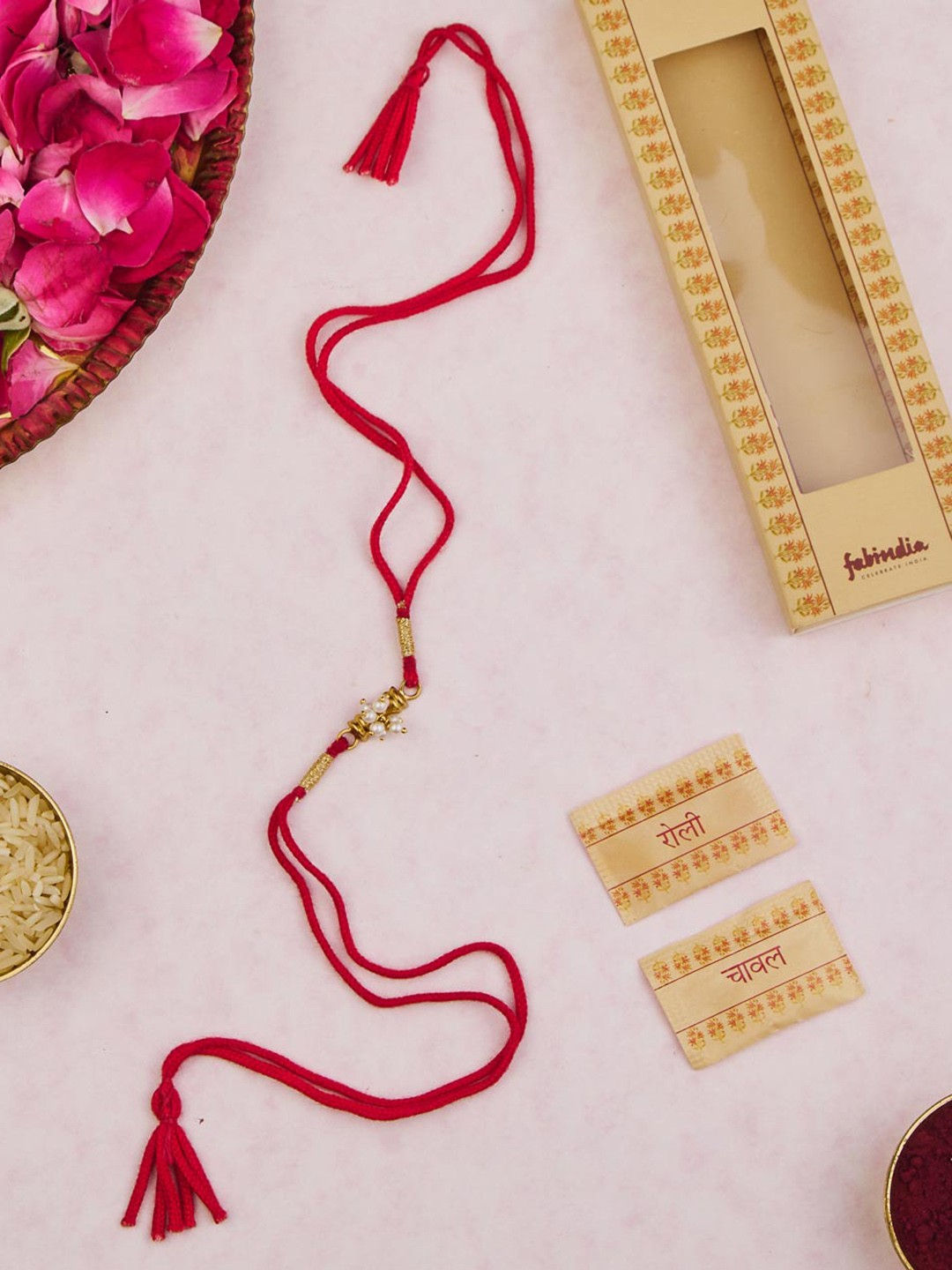 

Fabindia Gold-Plated Flower Rakhi With Roli & Chawal