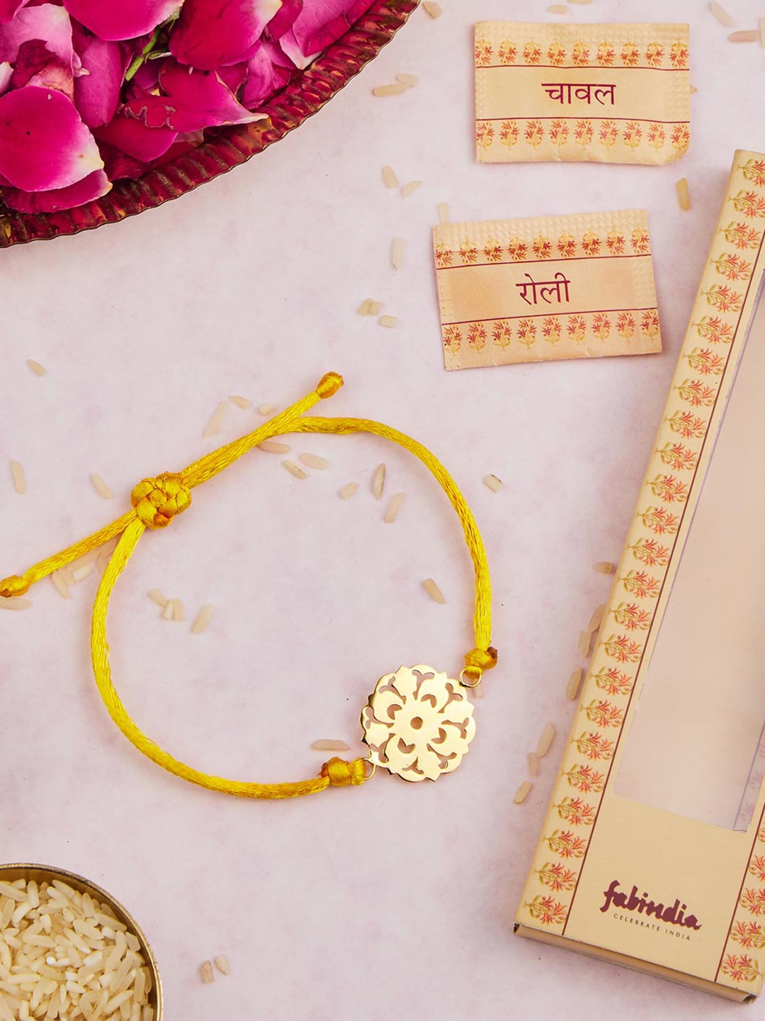

Fabindia Gold-Plated Rakhi With Roli & Chawal, Yellow