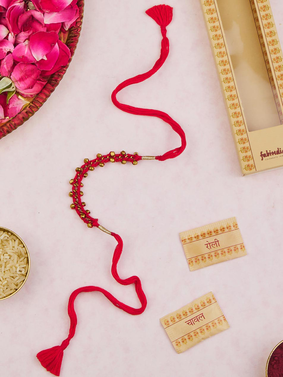 

Fabindia Dokra Beads Rakhi With Roli & Chawal, Red