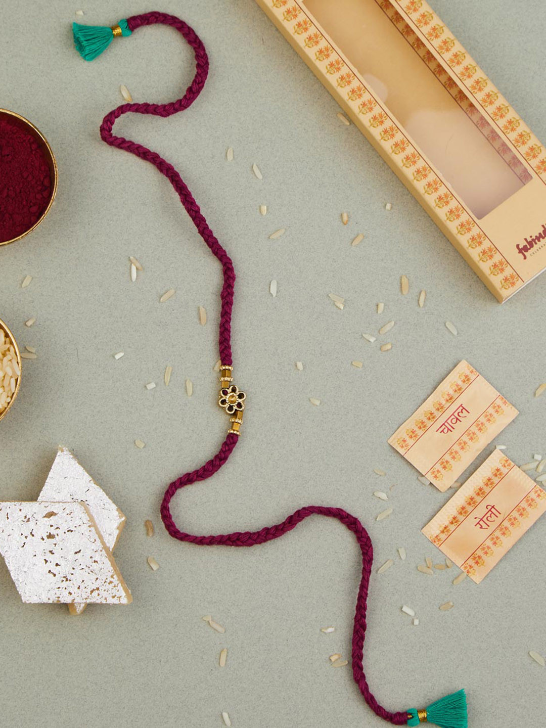 

Fabindia Metal Flower Rakhi With Roli & Chawal, Gold