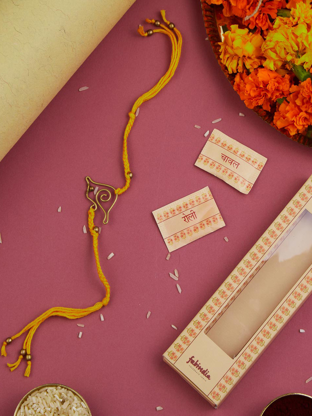 

Fabindia Kids Beaded Bird Thread Rakhi With Roli Chawl Pack, Gold