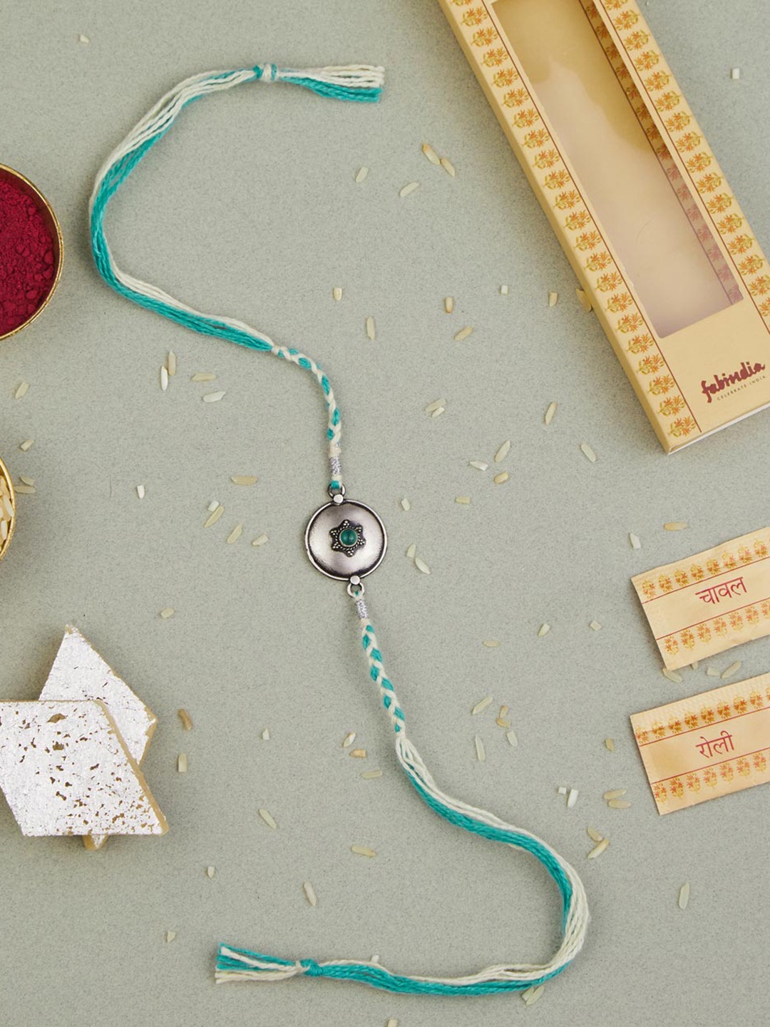 

Fabindia Silver Round Rakhi With Roli & Chawal