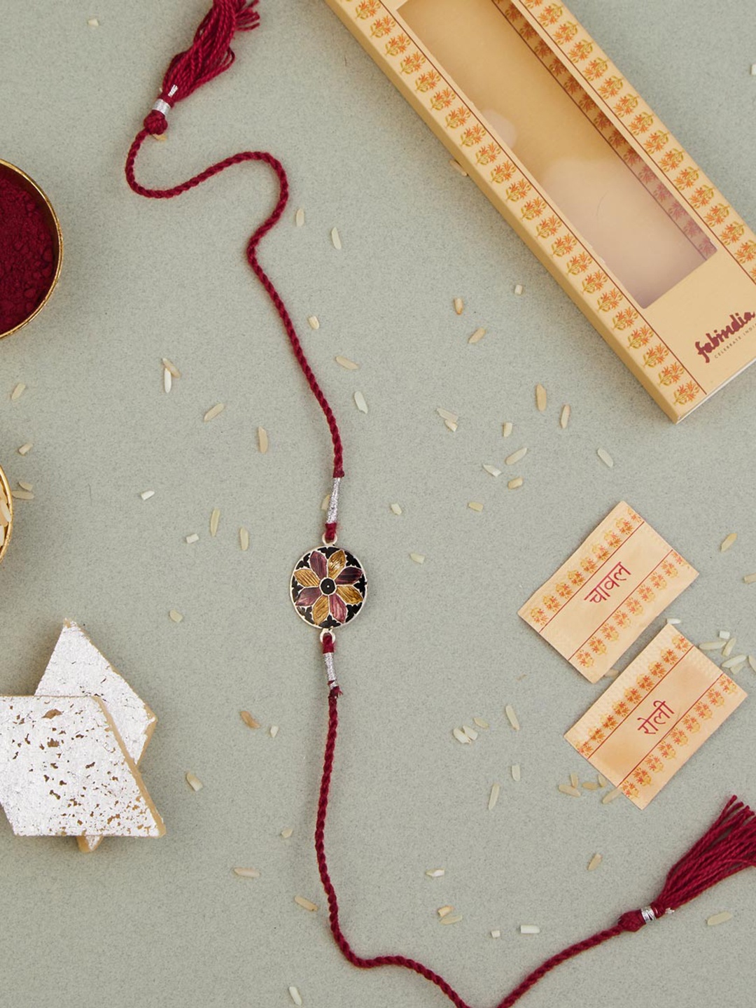 

Fabindia Silver Round Enamel Rakhi With Roli & Chawal