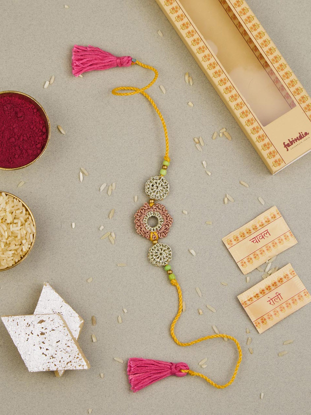 

Fabindia Crochet Floral Cotton Rakhi With Roli & Chawal, Pink