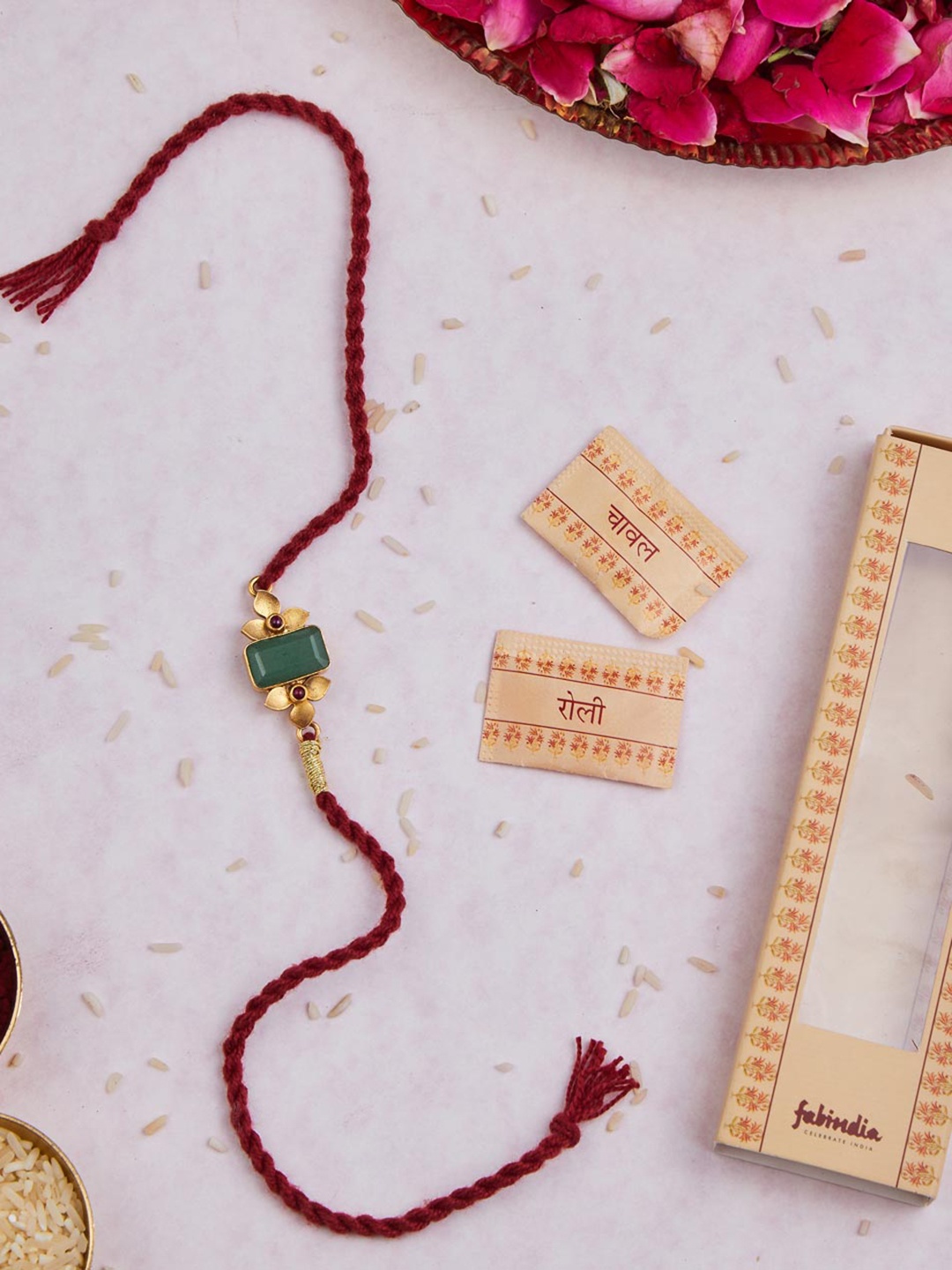 

Fabindia Silver Stone Rakhi Thread Rakhi With Roli Chawl Pack, Maroon