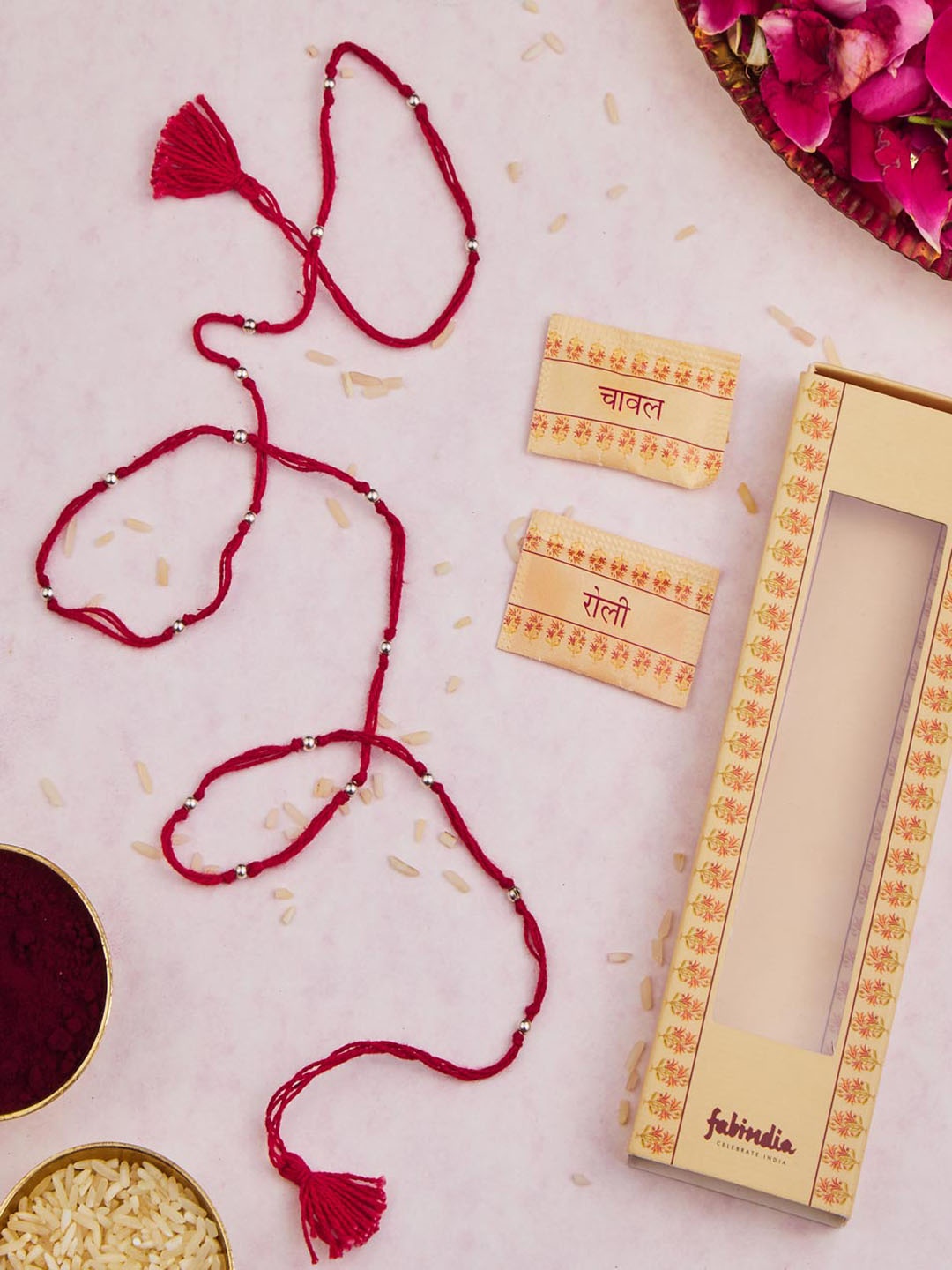

Fabindia Unisex Silver Beads Thread Rakhi With Roli Chawl Pack