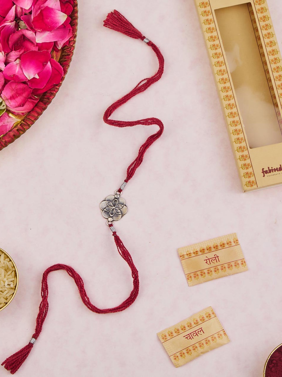 

Fabindia Unisex Silver Hexagon Patra Rakhi With Roli & Chawal